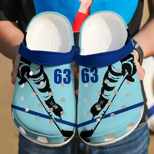 Hockey Player Neon Blue Personalize Clog Custom Crocs Clog Number On Sandal Fashion Style Comfortable For Women Men Kid Hockey Player Neon Blue Personalize Clog Custom Crocs Clog Number On Sandal Fashion Style Comfortable For Women Men Kid